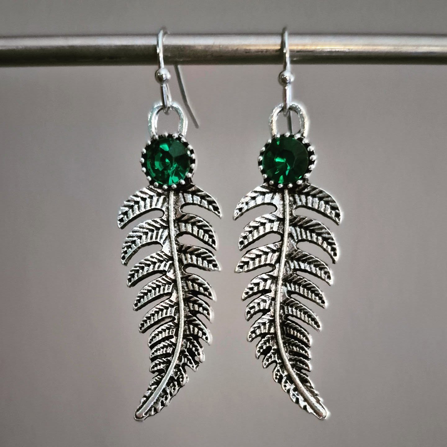 Silver Leaf Earrings With Green Crystal