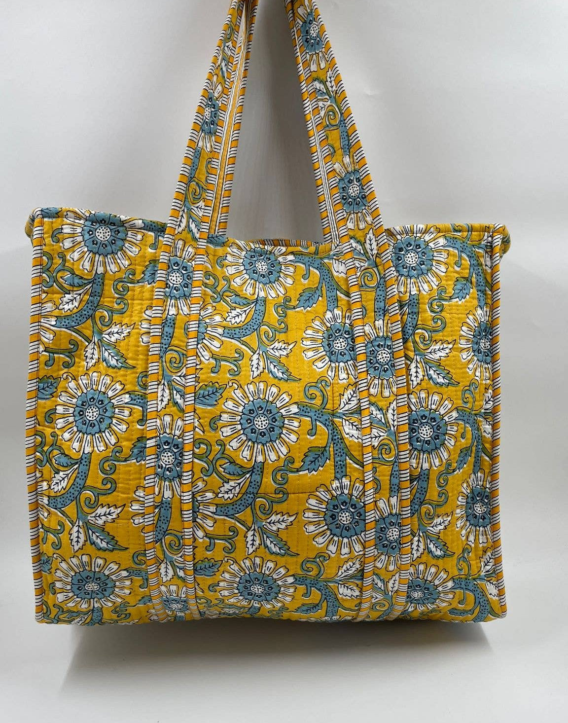 Floral patterned tote bag on a white background