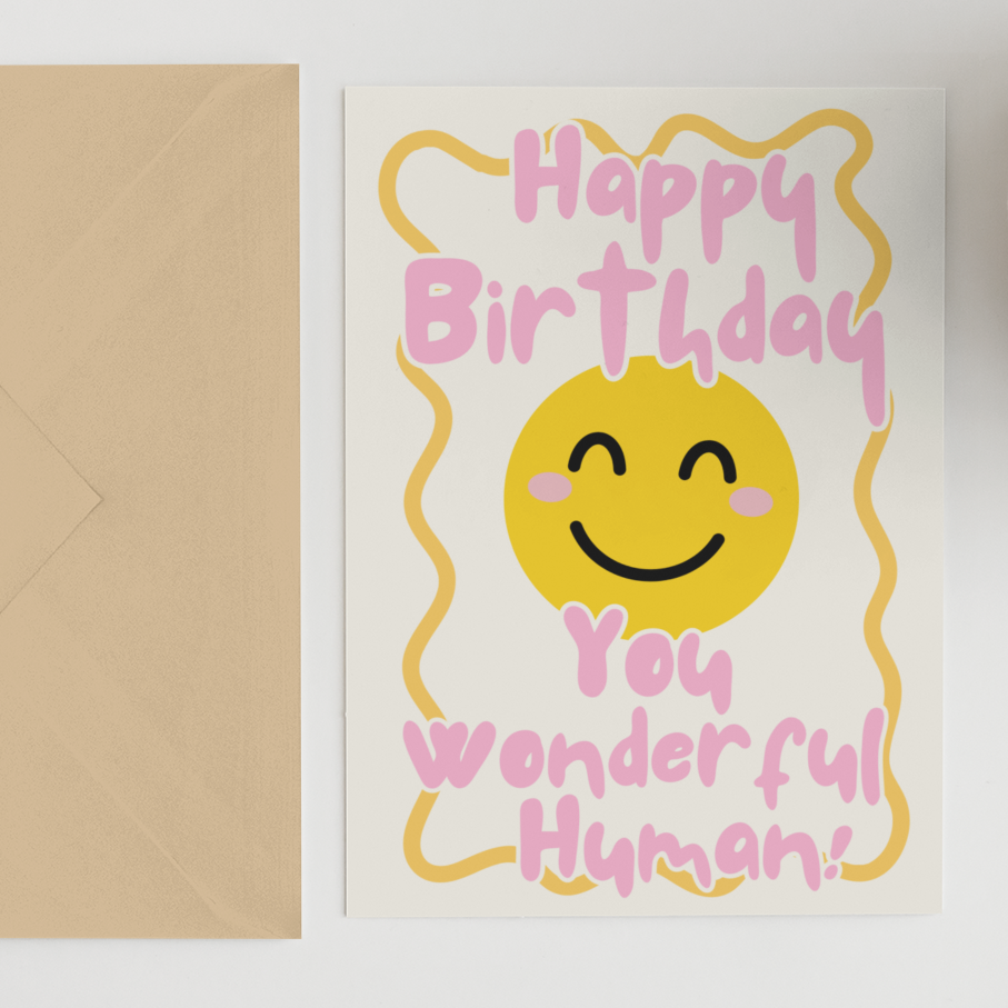 Happy Birthday card with smiley face and envelope on a white background