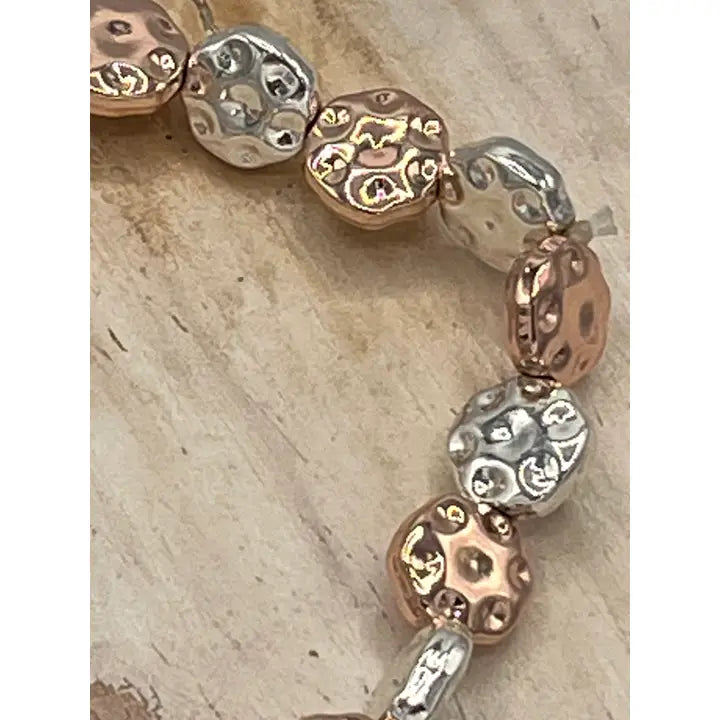 Battered Discs On Stretch Bracelet